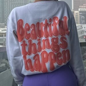 White Sweatshirt with Red Text